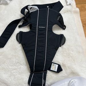 Baby carry on. Has a mark in front